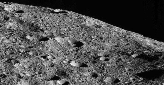 Take photos of mountains on the dwarf planet closest to Earth