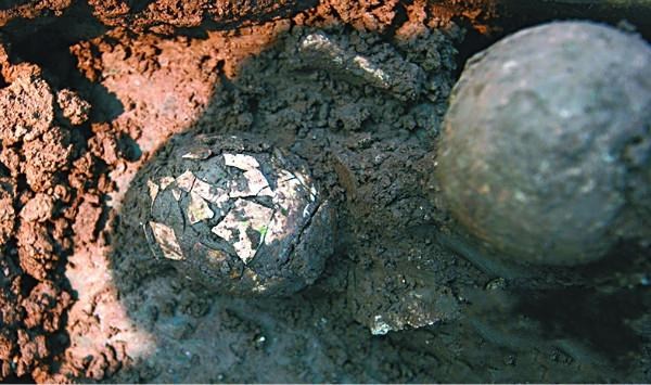 The 2,000-year-old chicken egg is still in the tomb