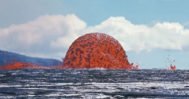The 20-meter-high lava tower is red in the sea