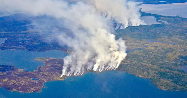 The Arctic is burning, threatening to open the ancient 'ice tomb' full of poisonous gas