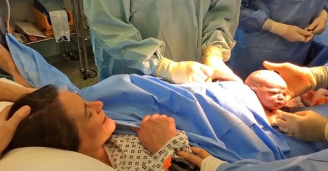 The baby comes out of the womb during a natural caesarean section