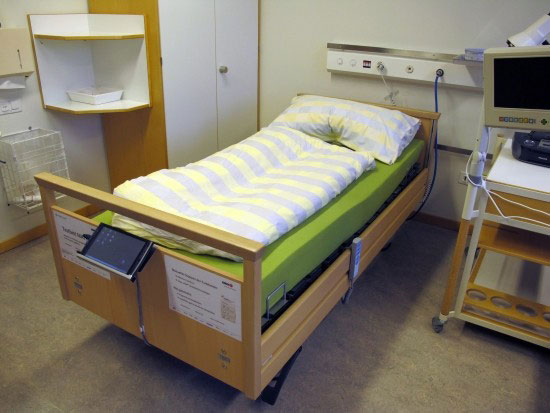 The bed helps the patient lessen pain