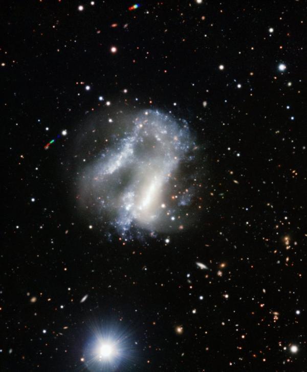 The chaos and strange duo of galaxies