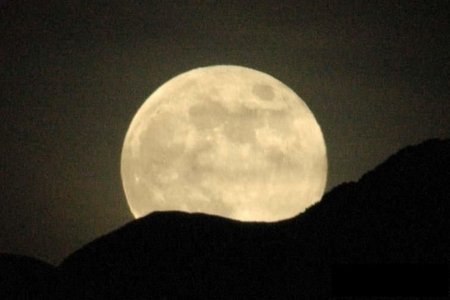 The dark side of the Moon gradually
