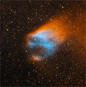 The fiery skull-shaped nebula passes through the galaxy