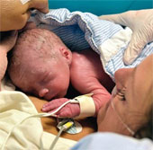 The first person to give birth with a uterus is implanted