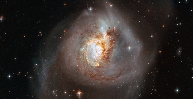 The galaxy deforms 100 million light-years from Earth