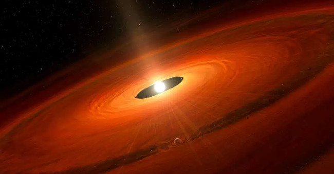 The giant planet forms around the star near the Earth