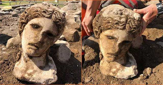 The marble head appeared on the ruins wall