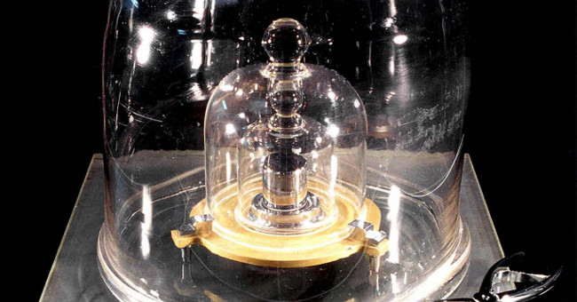 The method of replacing the standard platinum one kilogram weight