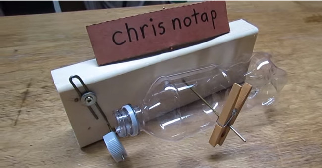 The mousetrap trap was hit by a plastic bottle