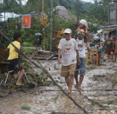 The number of people killed by storms in the Philippines exceeded 1,000