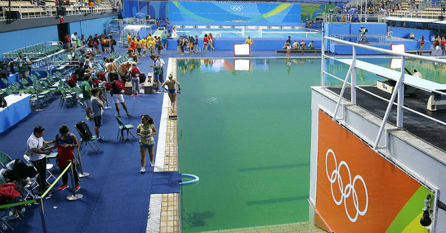 The Olympic pool was still green and now began to stink