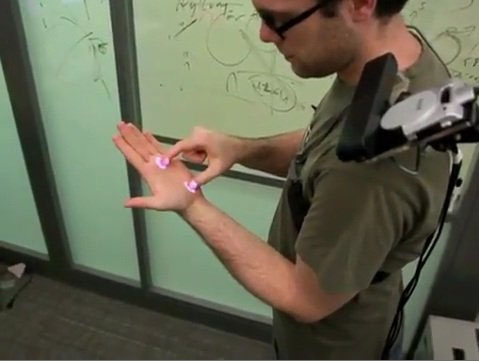 The Omnittouch system makes paper sheets an interactive surface