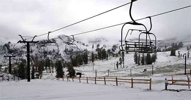 The rare sight, still in summer, is snowing in California