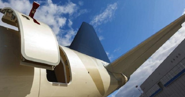 The reason for not being able to open the airplane door in mid-air
