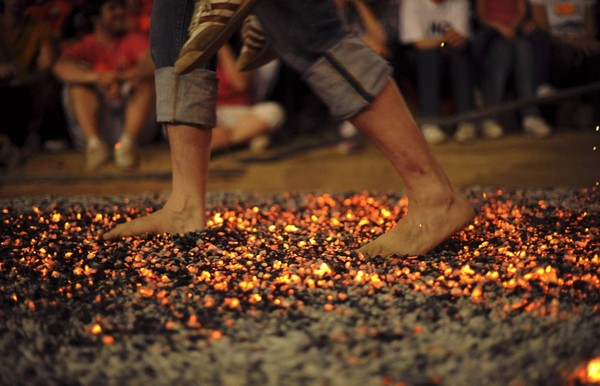 The reason 'you're still peaceful' when walking barefoot on glass, embers