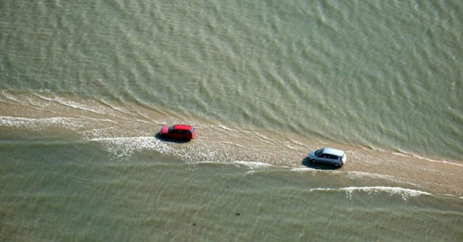 The road submerged under the water 2 times a day