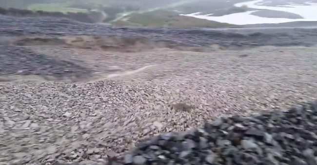 The rocky river swept through New Zealand gorge after a great storm