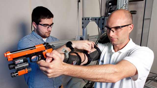 The skeleton attached to the hand helps new soldiers become marksmanship