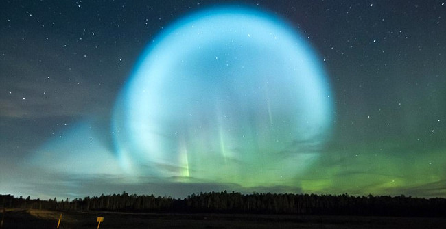 The sphere of light envelops the sky as the apocalypse in Siberia