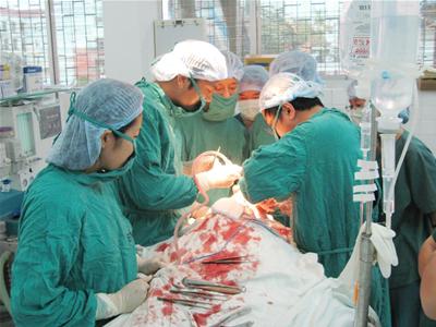 The surgery cuts two giant tumors on the patient's face