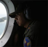 The three AirAsia passenger bodies held hands
