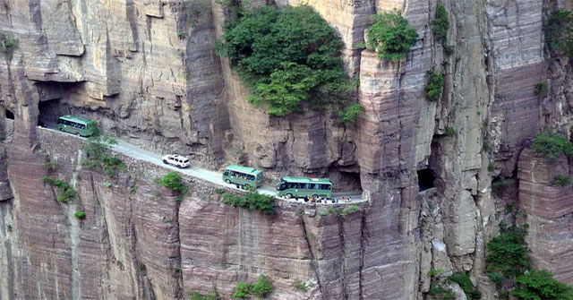 The tunnel runs through 1,700 m high cliffs, dug by hand for 5 years