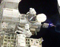 The two astronauts on the Atlantis ship made the first outing