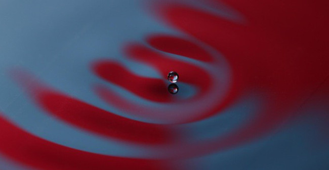 There was an explanation why a water particle could roll on the water without getting together