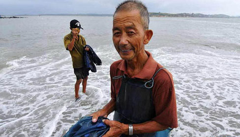Three storms simultaneously threaten China