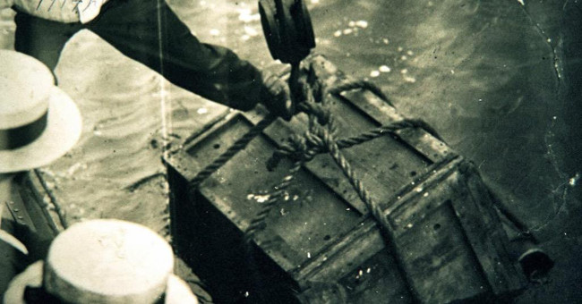 Topple the classic magic trick: handcuffed in a sealed container