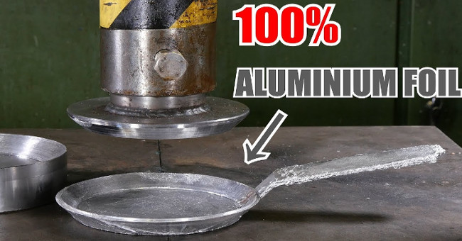 Turning foil into a slightly wasted aluminum globe, squeezing it into a frying pan is much better!