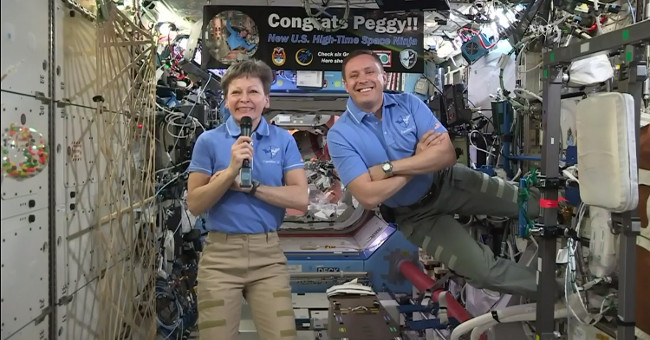 Two American astronauts go out to troubleshoot