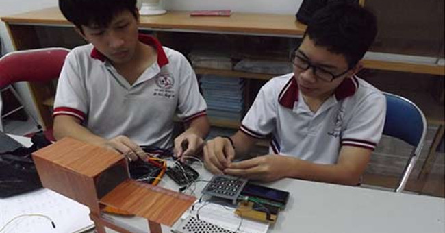 Two students built equipment to record nuclear radiation sources