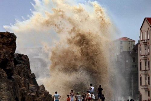 Typhoon Soudelor landed in mainland China, causing flash floods that killed at least eight people