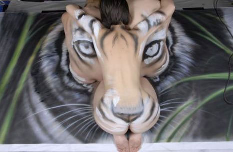 Unique tiger head painting from nude model