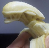 Use a spoon and toothpick to sculpt on a banana