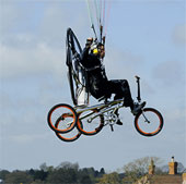 Video: Bicycle fly by parachute