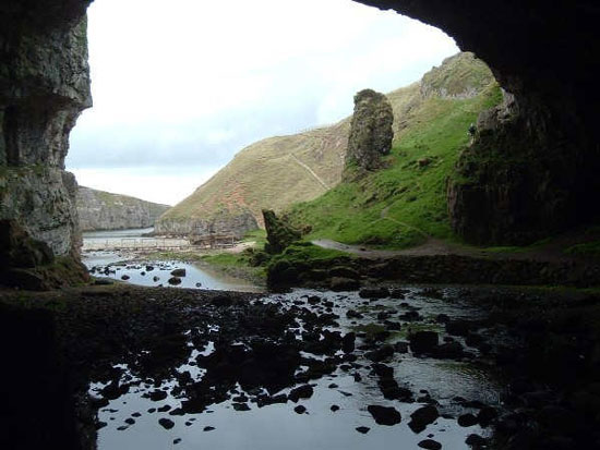 Waterfall in a rock cave in Scotland