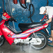 What do I notice when riding a summer motorbike?