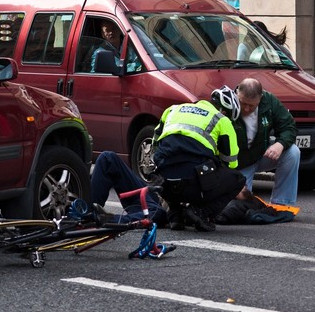 What do we need to do when we encounter a road accident?
