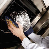 What happens if an aluminum object is placed in a microwave oven?