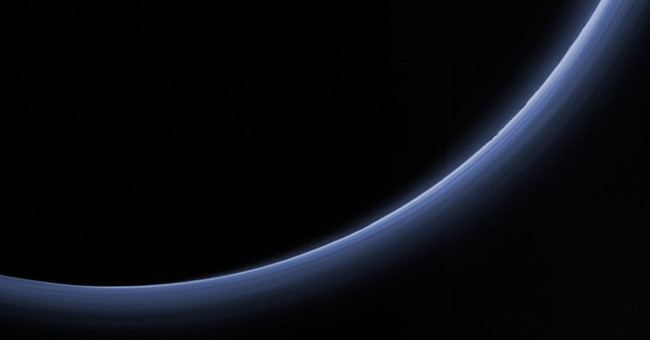 What is mysterious about Pluto's atmosphere?