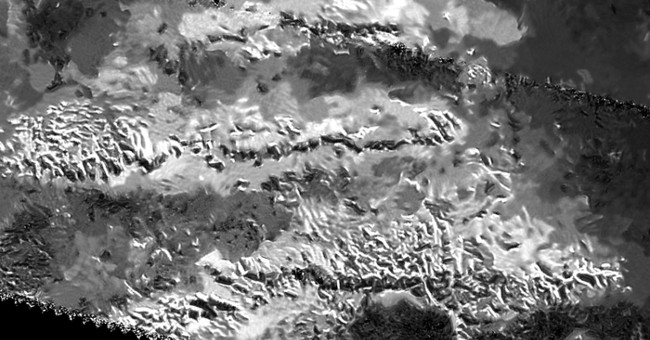 What's interesting at the highest peak of Moon Titan?