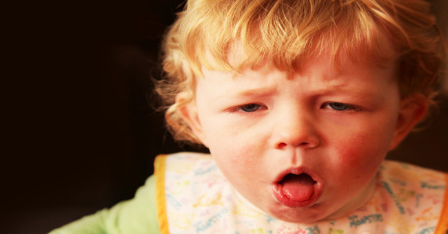 Why are babies born on caesarean section more susceptible to respiratory disease than babies born normally?
