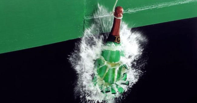 Why before the launch, people often break a bottle of wine?