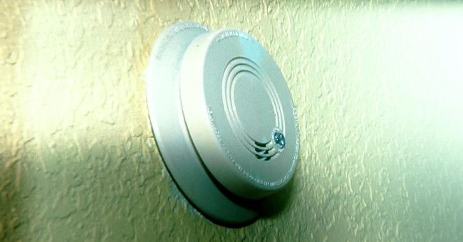 Why can the alarm system sound when there is no fire?