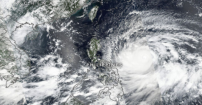 Why did Mangkhut become a super typhoon in the Pacific?