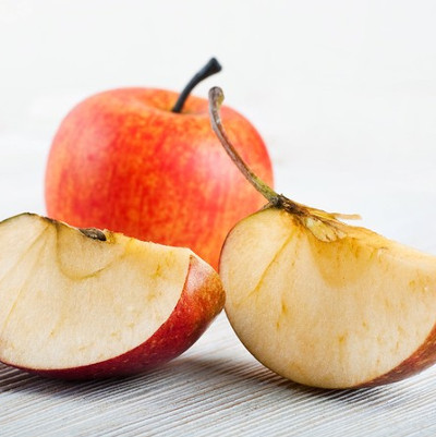 Why do apple pieces turn brown after cutting?